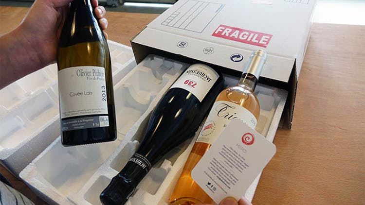 parcel of wine being opened